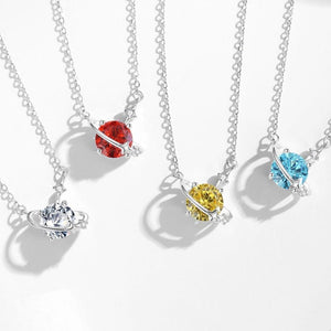 Three necklaces with colorful gemstones on a white background