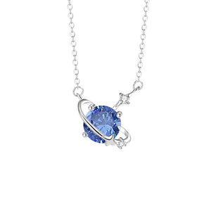 Silver necklace with a blue gemstone pendant on a white background