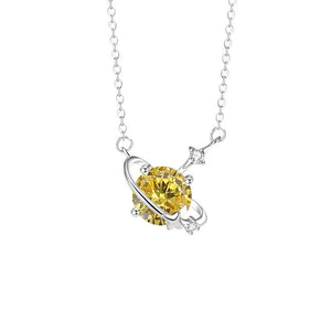 Yellow gemstone necklace with silver chain on a white background