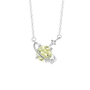 Silver necklace with a yellow gemstone pendant on a white background