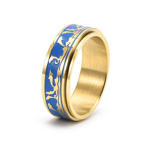 Gold ring with blue engraving on a white background