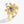 Gold evil eye flower spinner ring with a blue gemstone on a white background