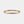 Gold bracelet with blue stones on a white background