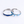 Two silver rings with blue gemstones on a white background