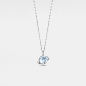 Necklace with a pendant featuring a blue gemstone on a light gray background