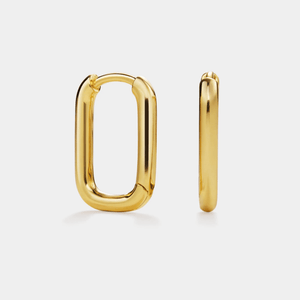 Gold hoop earrings on a white background