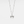 A gold-plated sterling silver bow tie charm on a chain, against a white background.
