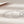 Two Mobius strip bracelets made of sterling silver, displayed on a white surface.