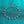 Silver bracelet with diamond-like charms on a teal background