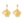 Pair of gold floral earrings on a white background