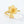 Gold flower-shaped ring on a white background