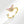 Gold ring with pink gemstones on a white background