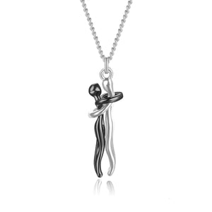 Couple Hug Two-Tone Pendant Necklace
