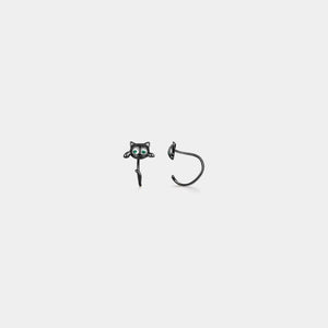 Black cat-shaped earring on a white background