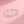 An image featuring two sterling silver rings with cherry blossom flower designs, one open band and one bypass ring, displayed on a pink background.