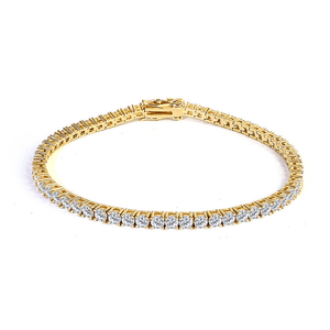 Gold bracelet with diamond accents on a white background