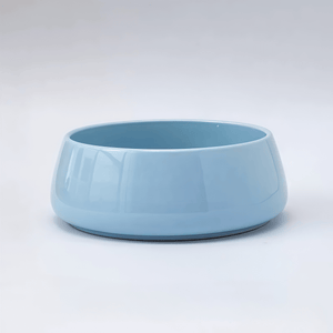 Light blue ceramic bowl on a white background