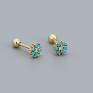 A collection of stud earrings with flower designs, featuring various colors and with gold plating.