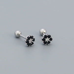 A collection of stud earrings with flower designs, featuring various colors and with gold plating.