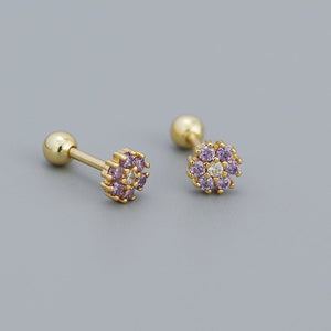 A collection of stud earrings with flower designs, featuring various colors and with gold plating.
