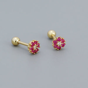 A collection of stud earrings with flower designs, featuring various colors and with gold plating.