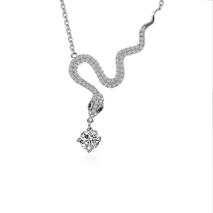 Silver snake-shaped necklace with a diamond pendant on a white background