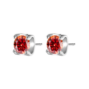 A pair of silver four-prong moissanite stud earrings with a hypoallergenic finish.