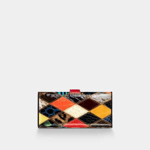 Multicolored patchwork wallet on a light gray background
