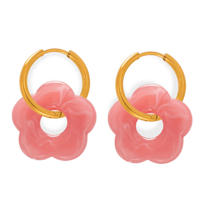 Pair of pink hoop earrings with gold accents on a white background