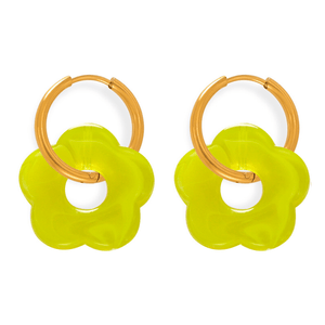 Pair of yellow flower-shaped earrings with gold hoop accents on a white background