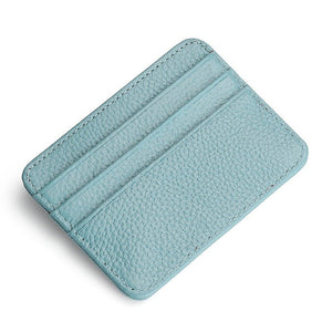 Light blue leather cardholder on a white background