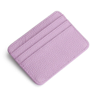 Purple leather cardholder on a white background