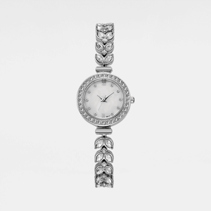 Silver watch with decorative band on a white background