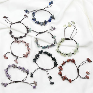 Set of colorful beaded bracelets on a white background