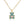 Gold teddy bear pendant with turquoise stones and a pink heart on a white background