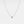 A gold-plated sterling silver necklace with a single red birthstone charm.