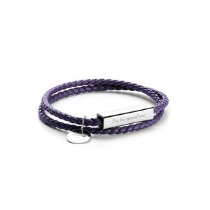 Purple braided bracelet with a silver tag on a white background