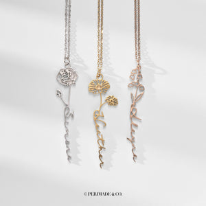 Three floral necklaces in silver, gold, and rose gold on a white background with 'PERIMADE & CO.' branding.