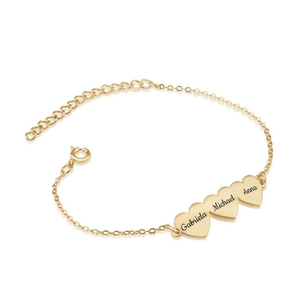 Gold bracelet with heart-shaped name charms on a white background