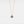 A custom photo projection necklace with a gold plating finish, featuring a circular blue charm on a chain.