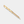 Gold pen on a light gray background