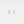Gold letter 'P' and 'E' earrings on a light gray background
