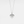 Silver heart-shaped locket necklace with a star and diamond on a light gray background
