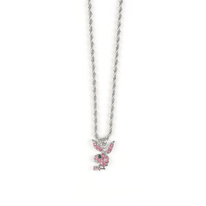 A collection of bunny pendant necklaces in silver and gold colors displayed on a stand, with adjustable chains.