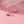 Cherry-themed earrings on a pink background