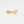 Gold bow-shaped ring on a white background