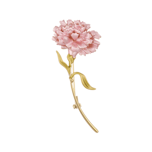 Pink flower brooch with gold stem on a white background