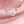 Silver fox-shaped ring with blue stones on a pink fabric background