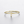 Gold bracelet with a letter 'T' on a light gray background