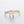 Gold bracelet with letter 'R' design on a light gray background
